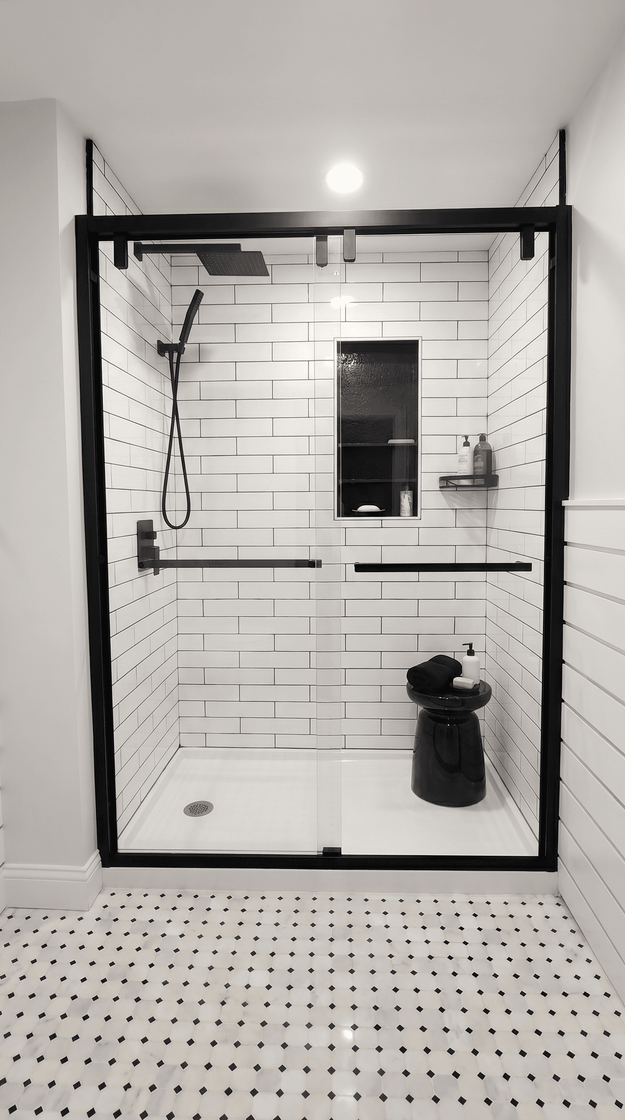 Black Framed Shower with Subway Tile