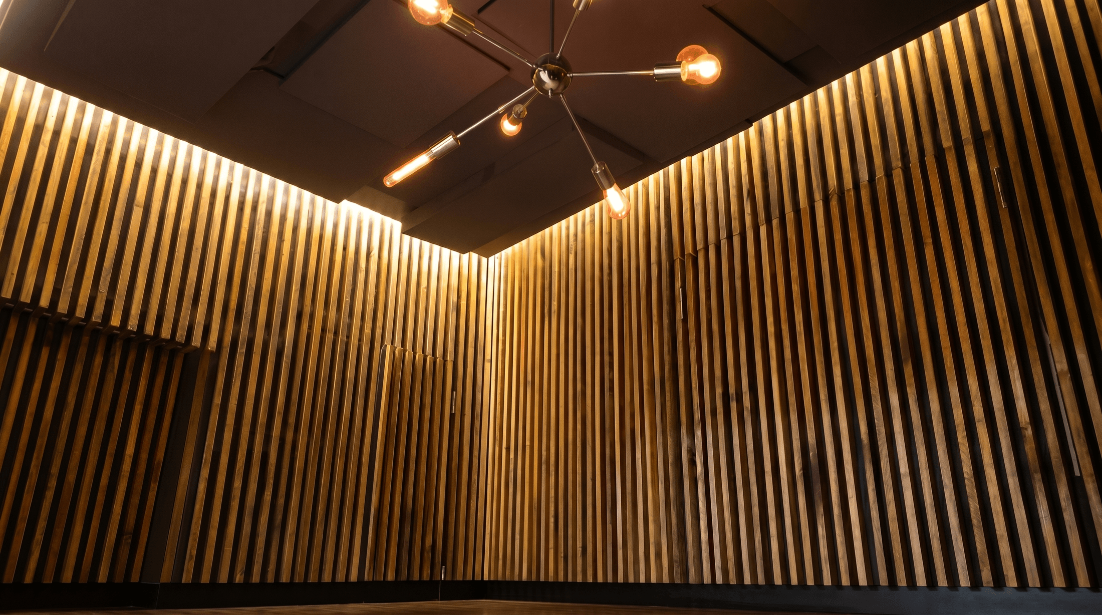Uplighted Wood Slat Corner Wall